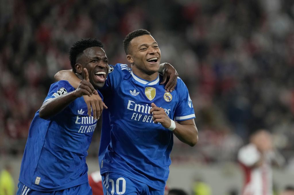 Kylian Mbappe and Real Madrid celebrate a dramatic win.